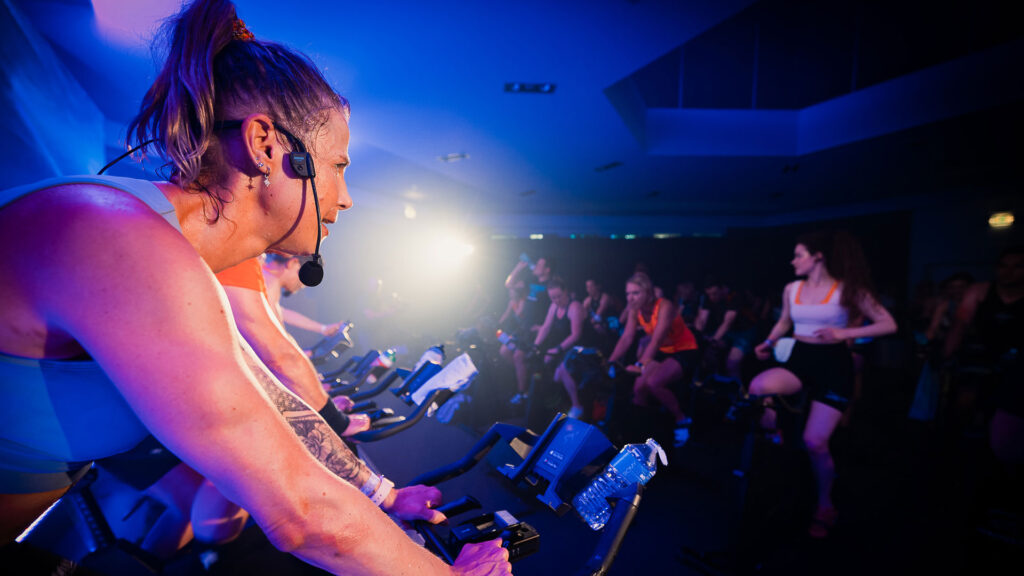 Indoor cycling instructor at indoor cycling event