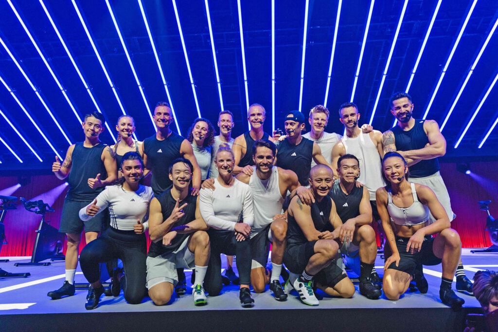 presenters at les mills rpm100 live event with diverse ages